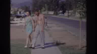 Sacramento California USA (1966): Couple Walks Together Holding Hands