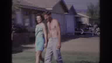 Sacramento California USA (1966): A Young Man And A Young Woman Walk Hand And Hand