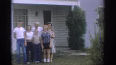 Sacramento California USA (1966): Family Poses For Photograph Gathered At The Door
