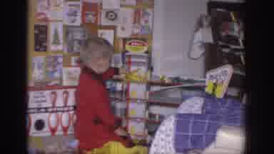 Sacramento California USA (1966): Boy Playing With Christmas Gift During A Family