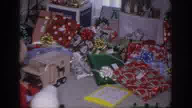 Sacramento California USA (1966): A Child, In A Red Robe, Pushing A Toy Cement
