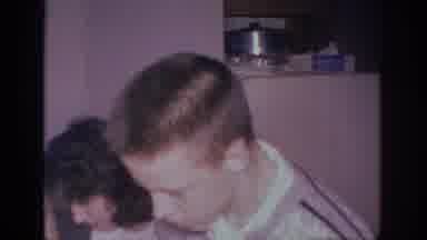 Sacramento California USA (1966): 3 People In The Kitchen Discussing Together