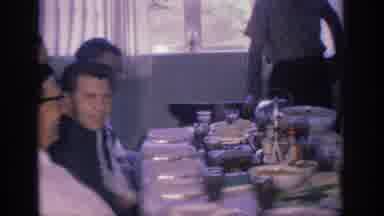 Sacramento California USA (1966): A Family Is Have A Dinner Party And Lounging