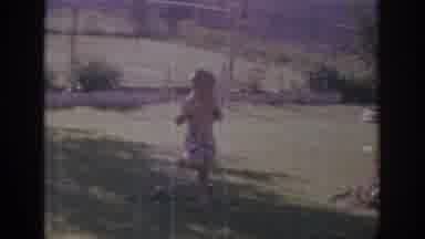 Sacramento California USA (1966): Toddler Playing On A Lawn Running In Shorts