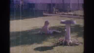 Sacramento California USA (1966): Child Playing In The Yard On A Summer Day
