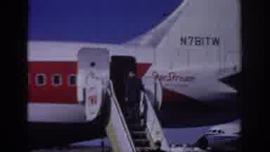 Sacramento California USA (1966): Men In Suits Climb Up Boarding Steps To Enter
