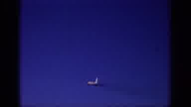 Sacramento California USA (1966): Airplane In The Sky With Smoke Trailing