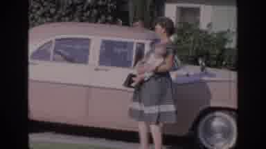 Oklahoma USA (1967): Mother Carrying Her Baby Walking With Toddler On A Sunny Day