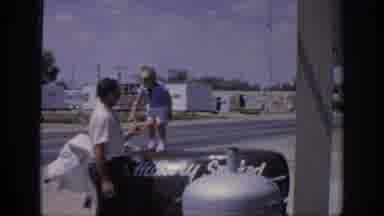 Oklahoma USA (1967): Man Plays With Child On The Edge Of The Track In Front Of A
