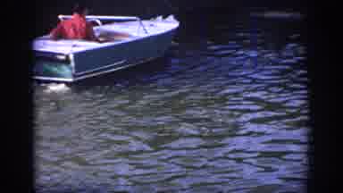 Oklahoma USA (1967): Guy On A Motor Boat Boat On The River