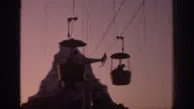 Oklahoma USA (1967): Sunset At An Amusement Park With People In Rides