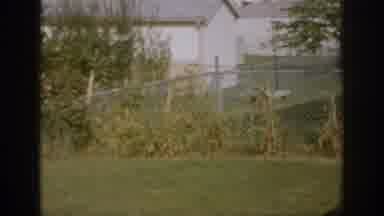 Oklahoma USA (1967): Recording Of Family Home Backyard And Fence, And Child
