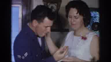 Oklahoma USA (1967): Man In Military And Woman In Wedding Dress Share Wedding Cake
