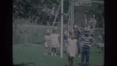 Oklahoma USA (1967): Kids Playing In The Playground On A Warm Sunny Day Taking