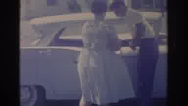 Oklahoma USA (1967): Man And Woman Talking By A An Old Car Then He Hands Her