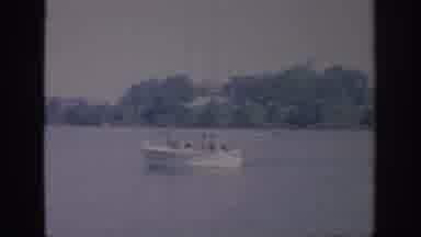 Oklahoma USA (1967): A Speedboat Is Going Fast On A Lake Behind Another Boat