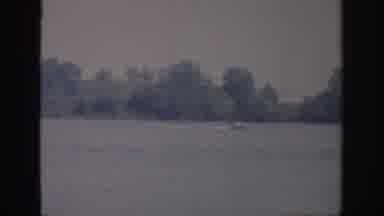 Oklahoma USA (1967): People On A Porch And Someone Skiing On The Water