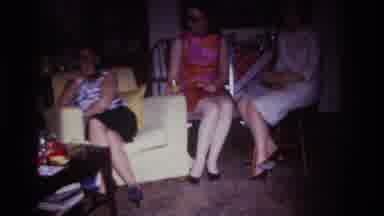 Rockaway Beach New York USA (1967): Three Women In Skirts And A Man At A Small