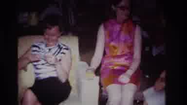 Rockaway Beach New York USA (1967): Three Women Drinking Gesturing Talking