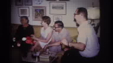 Rockaway Beach New York USA (1967): Family Is Having A Good Time Sitting Around