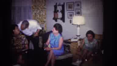 Rockaway Beach New York USA (1967): Woman In Blue Dress Sitting In Living Room