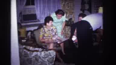 Rockaway Beach New York USA (1967): Family Sits And Chats Over A Beer