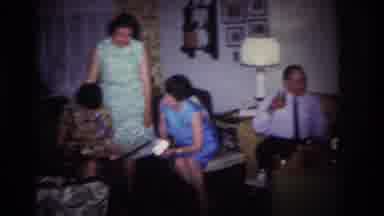 Rockaway Beach New York USA (1967): Six Adults Eating And Conversing On Couches In