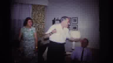 Rockaway Beach New York USA (1967): Adults Gathered Playing A Game Of Charades