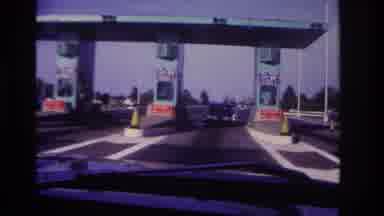 Rockaway Beach New York USA (1967): Driver Approaches A Toll Booth And Comes To A