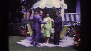 Rockaway Beach New York USA (1967): Man Shows Off A Piece Of Paper
