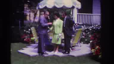 Rockaway Beach New York USA (1967): Man Showing Couple Information On A Pamphlet