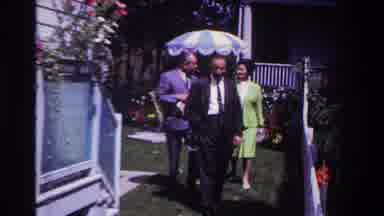 Rockaway Beach New York USA (1967): A Dressed Up Family Walking Together To Some