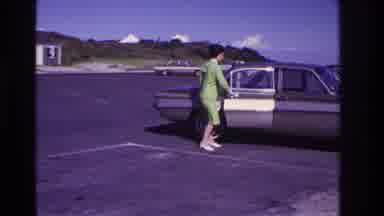 Rockaway Beach New York USA (1967): Woman Opened Car Door In Parking Lot On A