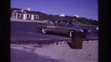 Rockaway Beach New York USA (1967): Two People Entering A Car That Was Parked At A