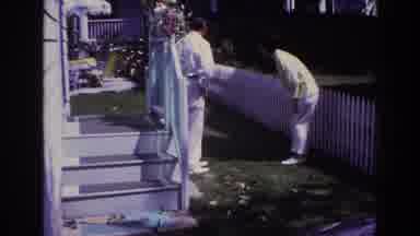 Rockaway Beach New York USA (1967): A Man And A Woman In The Garden