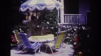 Rockaway Beach New York USA (1967): Lady Outside Moving Her Cat