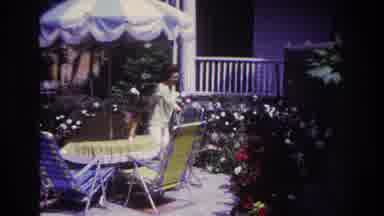 Rockaway Beach New York USA (1967): Woman And Cat Sitting In Backyard Garden