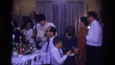 Rockaway Beach New York USA (1967): A Party Scene With Multiple People And One