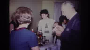 Rockaway Beach New York USA (1967): Several People Gathered Eating
