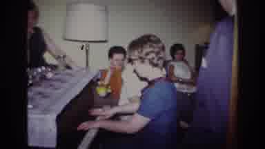 Rockaway Beach New York USA (1967): Caucasian Family Attentively Listening To