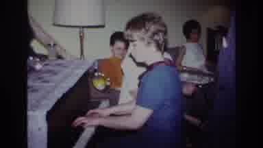 Rockaway Beach New York USA (1967): Pretty Lady In A Blue Dress Playing The Piano