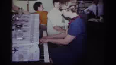 ROCKAWAY BEACH NEW YORK USA-1967: Young Pianist Playing Piano In Living Room With Family