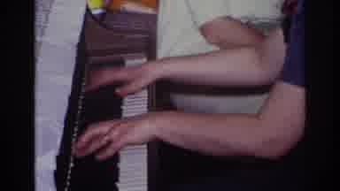 Rockaway Beach New York USA (1967): Woman Playing Piano In Living Room With Family