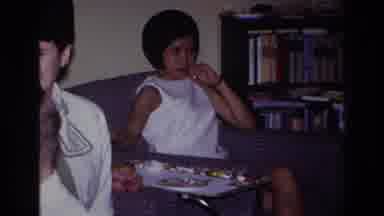 Rockaway Beach New York USA (1967): Smiling Woman Sitting On The Couch