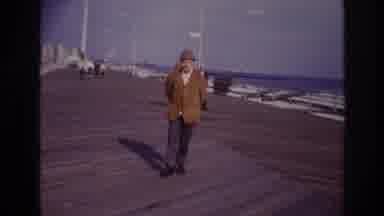 Rockaway Beach New York USA (1967): Man Walks Close At The Pier Calm Waves Splash