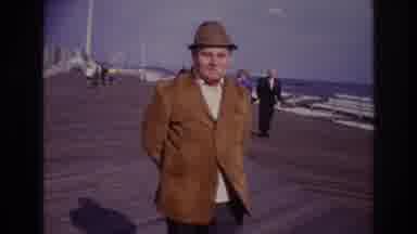 Rockaway Beach New York USA (1967): Man Walking On Dock While Ships Sail In The