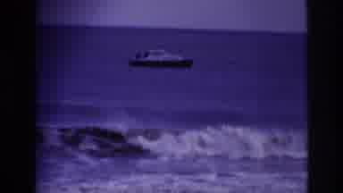 Rockaway Beach New York USA (1967): Boat In Ocean Floating On The Big Waves Of The