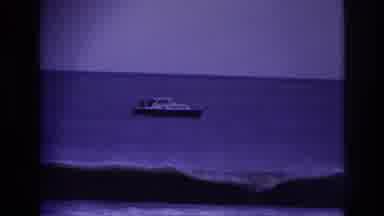 ROCKAWAY BEACH NEW YORK USA-1967: The Boat In The Blue Sea With The Airplane In The Sky