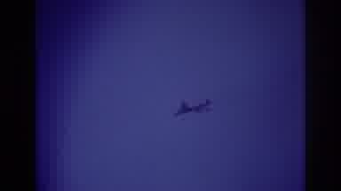 Rockaway Beach New York USA (1967): Scene Of Airplane Flying Overhead In Clear