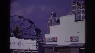 Rockaway Beach New York USA (1967): Ferris Wheel Spinning In The Distance At The